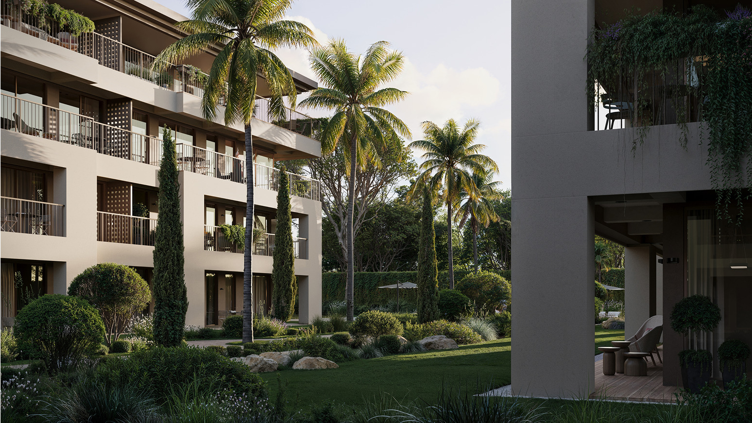 Luxury apartments with lush gardens and palm trees. Landscaped courtyard between buildings.