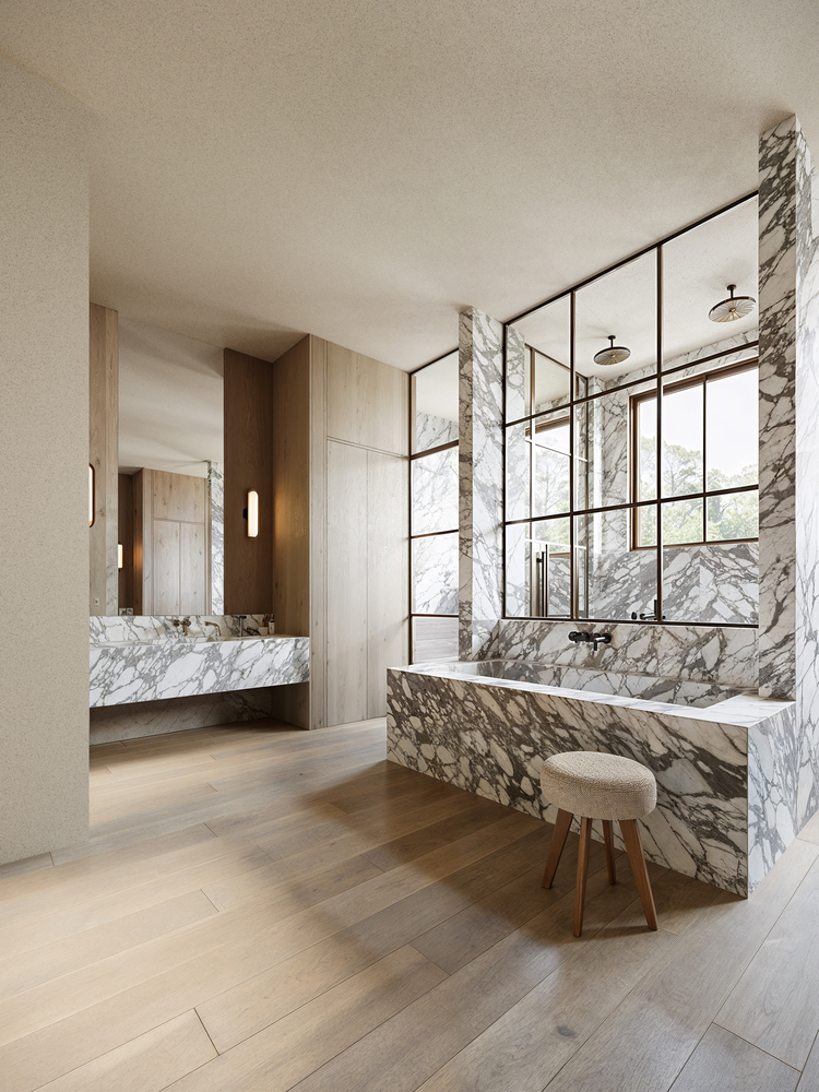 Luxurious marble bathroom with freestanding tub, wood floors, and large windows.