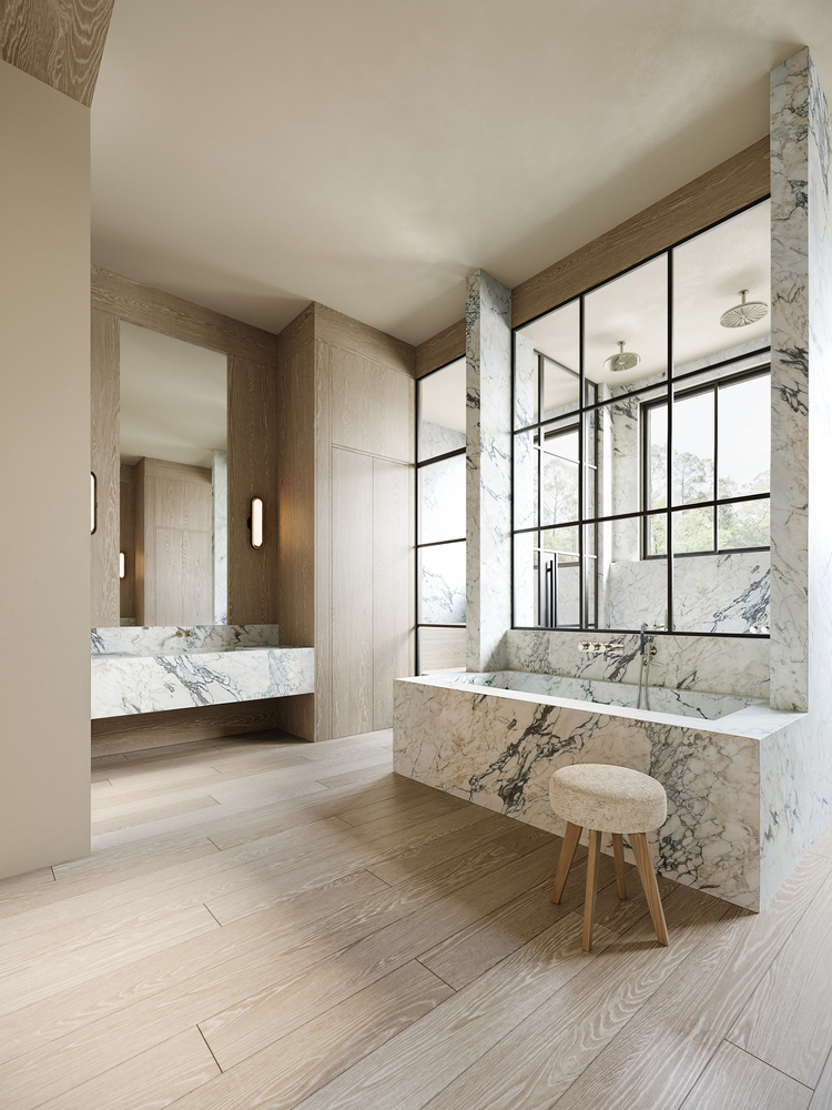 Luxurious modern bathroom with marble bathtub, double vanity, and wood floors.