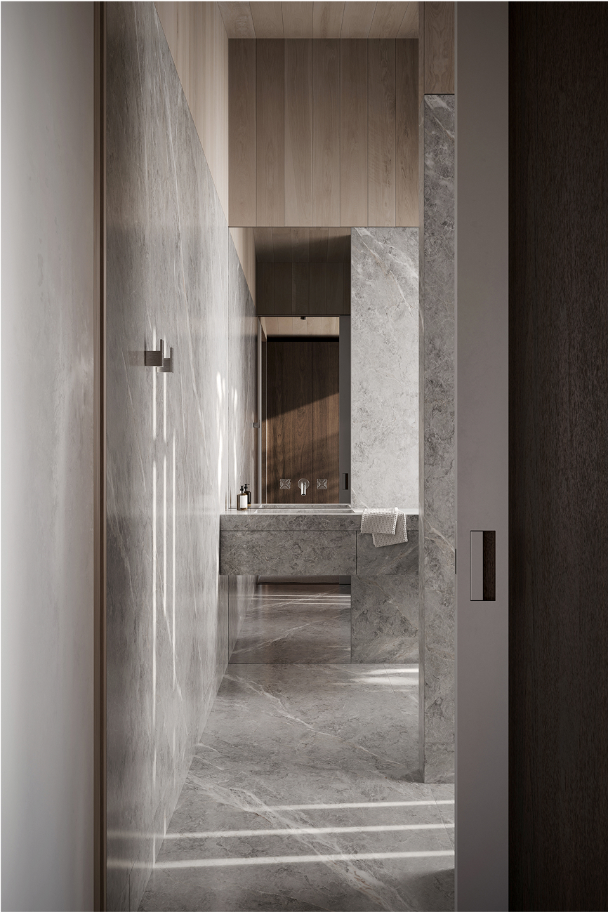 Modern minimalist bathroom with grey marble walls and a floating vanity.