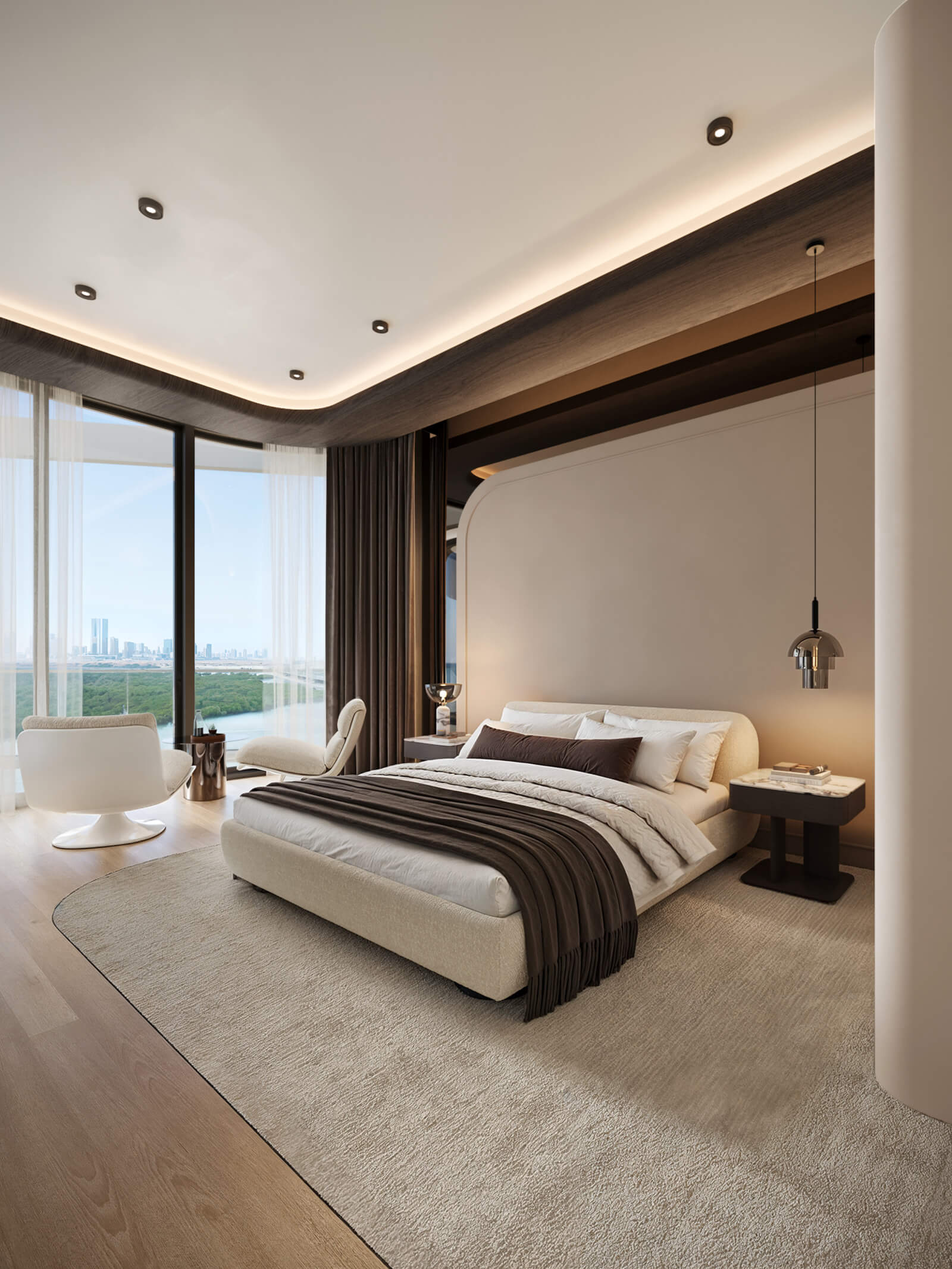 Modern bedroom with city view, featuring a plush bed and comfortable seating.