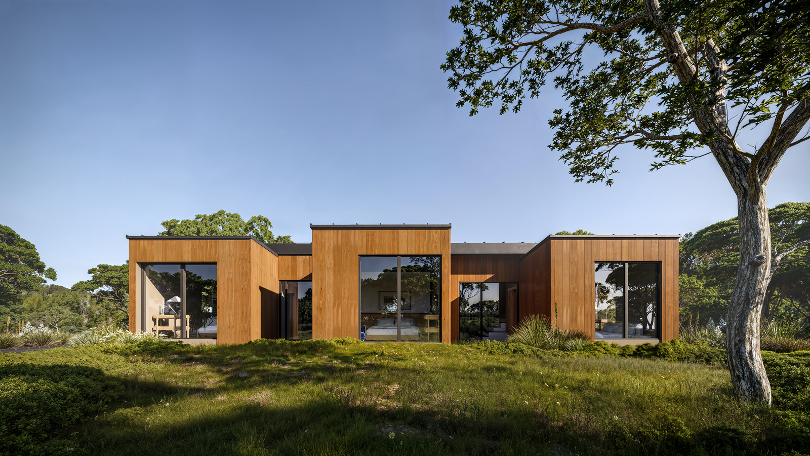Modern wooden home with large windows, showcasing 3D house rendering services.